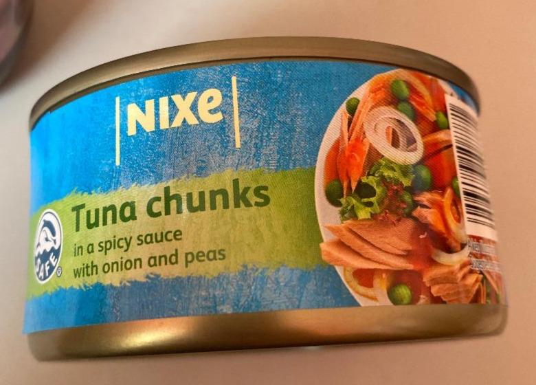 Photo - Tuna chunks in a spicy sauce with onion and peas Nixe